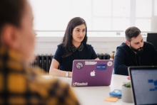 Young white woman in front of computer